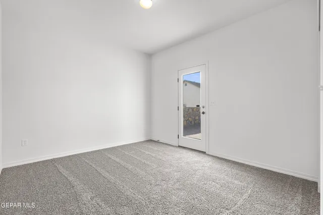 an empty room with an entrance