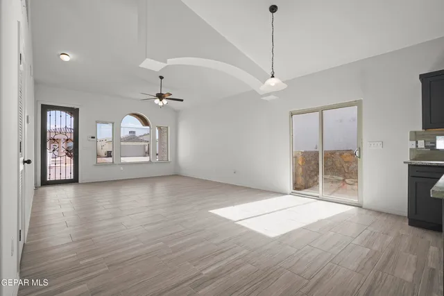 a view of livingroom with hardwood floor and a ceiling fan