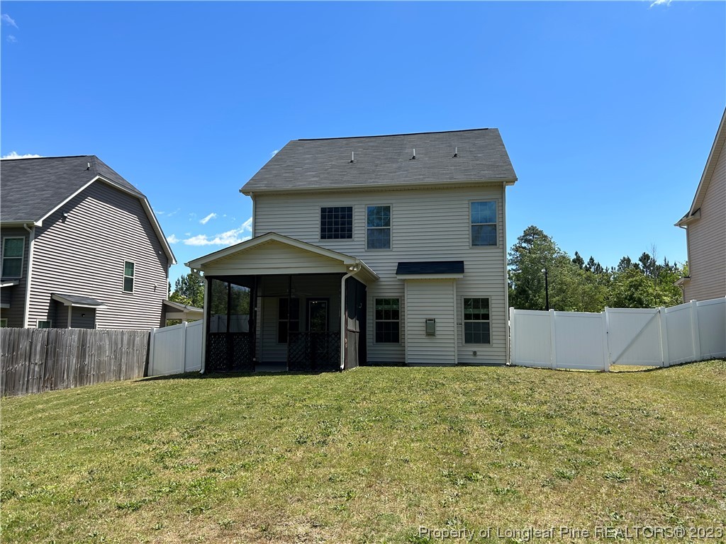 145 Taplow Trail Cameron, NC 28326 - Photo 15 of 15 a view of a house with a yard