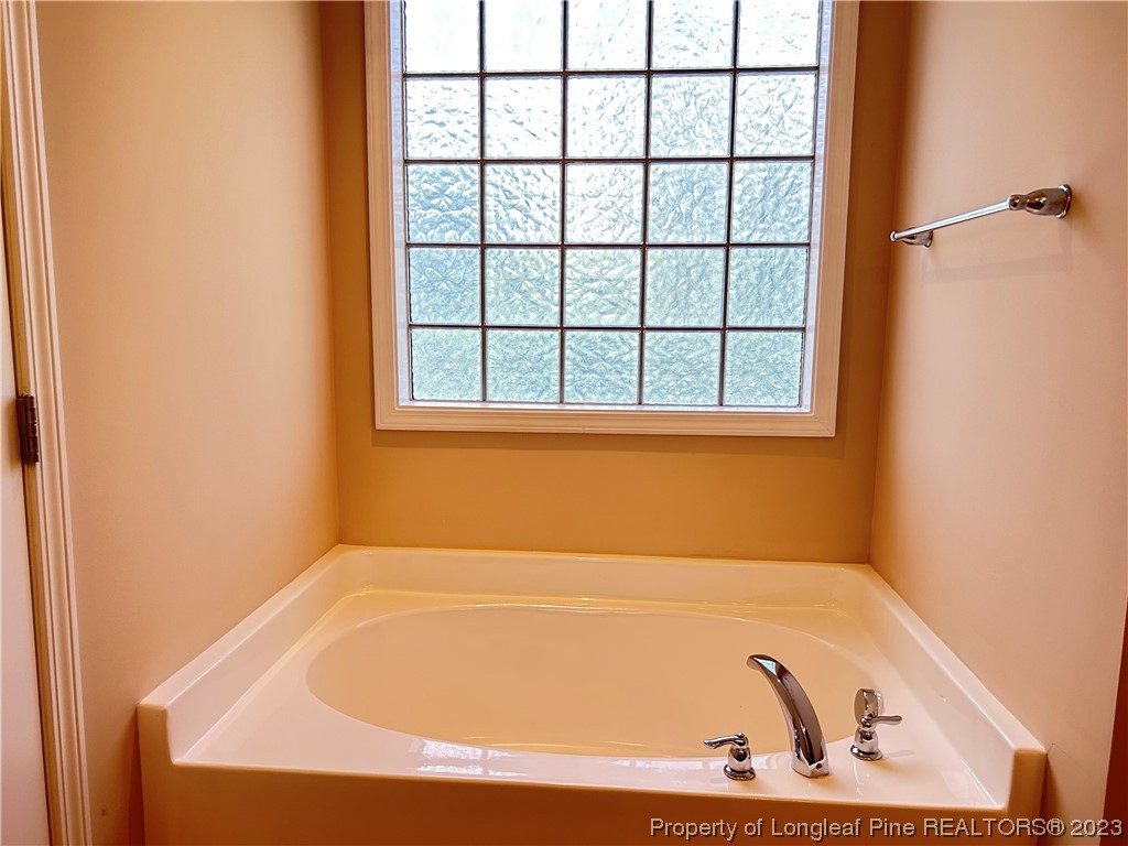145 Taplow Trail Cameron, NC 28326 - Photo 10 of 15 a bathroom with a bathtub