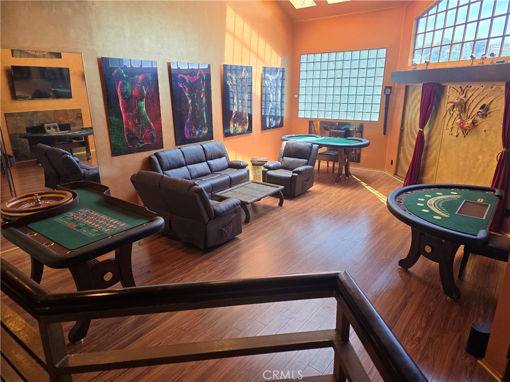 2189 B Sunset Plaza Drive Los Angeles, CA 90069 - Photo 27 of 53 a living room with furniture a rug and a window