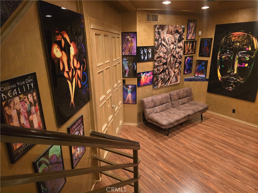 2189 B Sunset Plaza Drive Los Angeles, CA 90069 - Photo 28 of 53 a living room with furniture and a flat screen tv