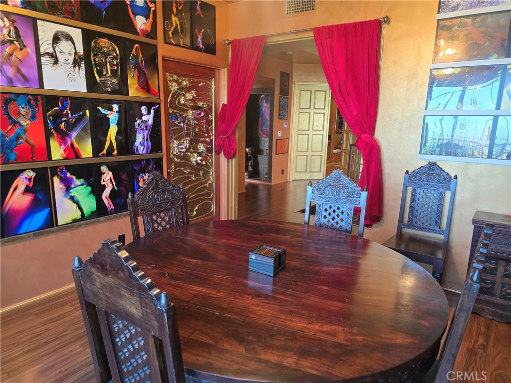 2189 B Sunset Plaza Drive Los Angeles, CA 90069 - Photo 33 of 53 a view of a dining room with furniture and toys
