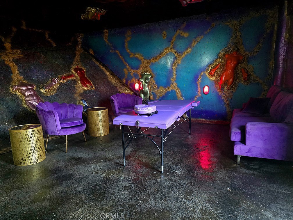 2189 B Sunset Plaza Drive Los Angeles, CA 90069 - Photo 43 of 53 a view of a room with a dining table chairs and a fire pit