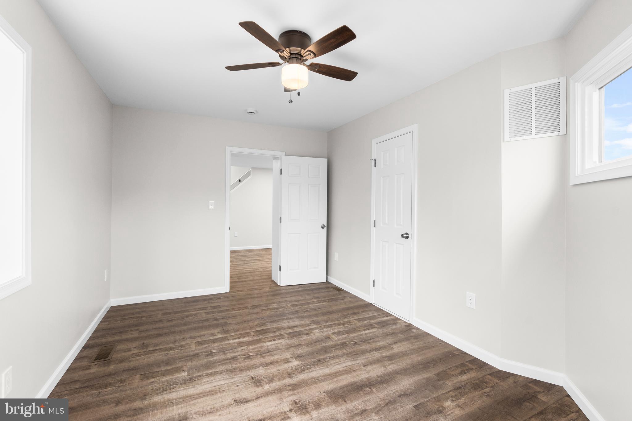 4686 A Street Southeast Washington, DC 20019 - Photo 12 of 28 a view of empty room with wooden floor