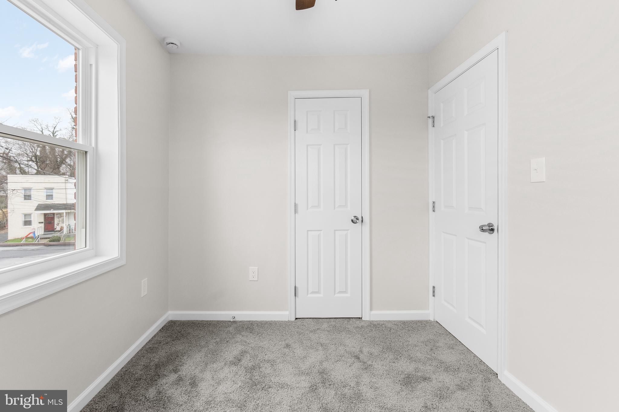 4686 A Street Southeast Washington, DC 20019 - Photo 19 of 28 a view of an empty room with a window
