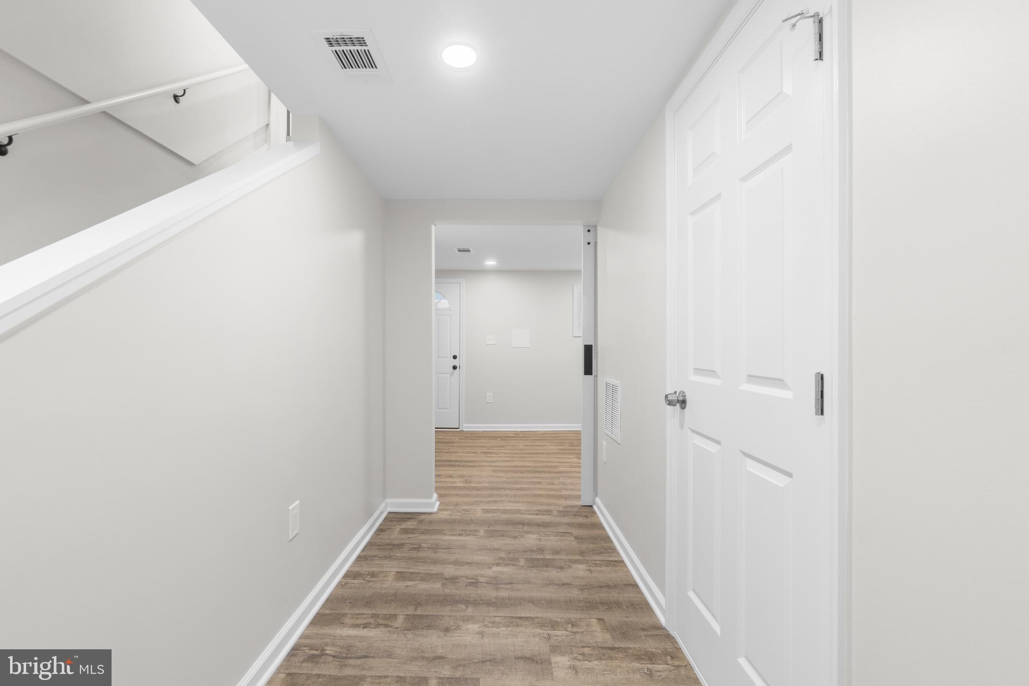 4686 A Street Southeast Washington, DC 20019 - Photo 22 of 28 a view of a hallway with wooden floor