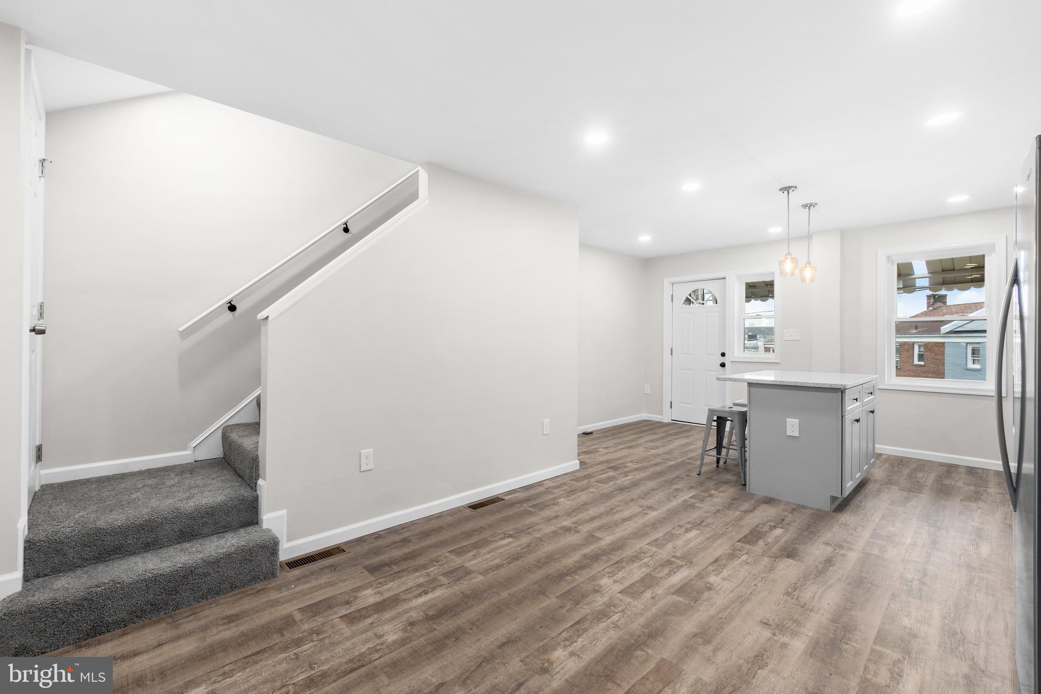 4686 A Street Southeast Washington, DC 20019 - Photo 6 of 28 a view of kitchen with wooden floor and electronic appliances