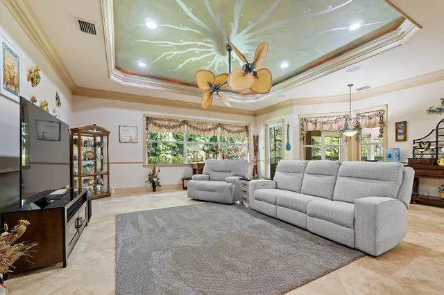 a large kitchen with a large counter top appliances and cabinets