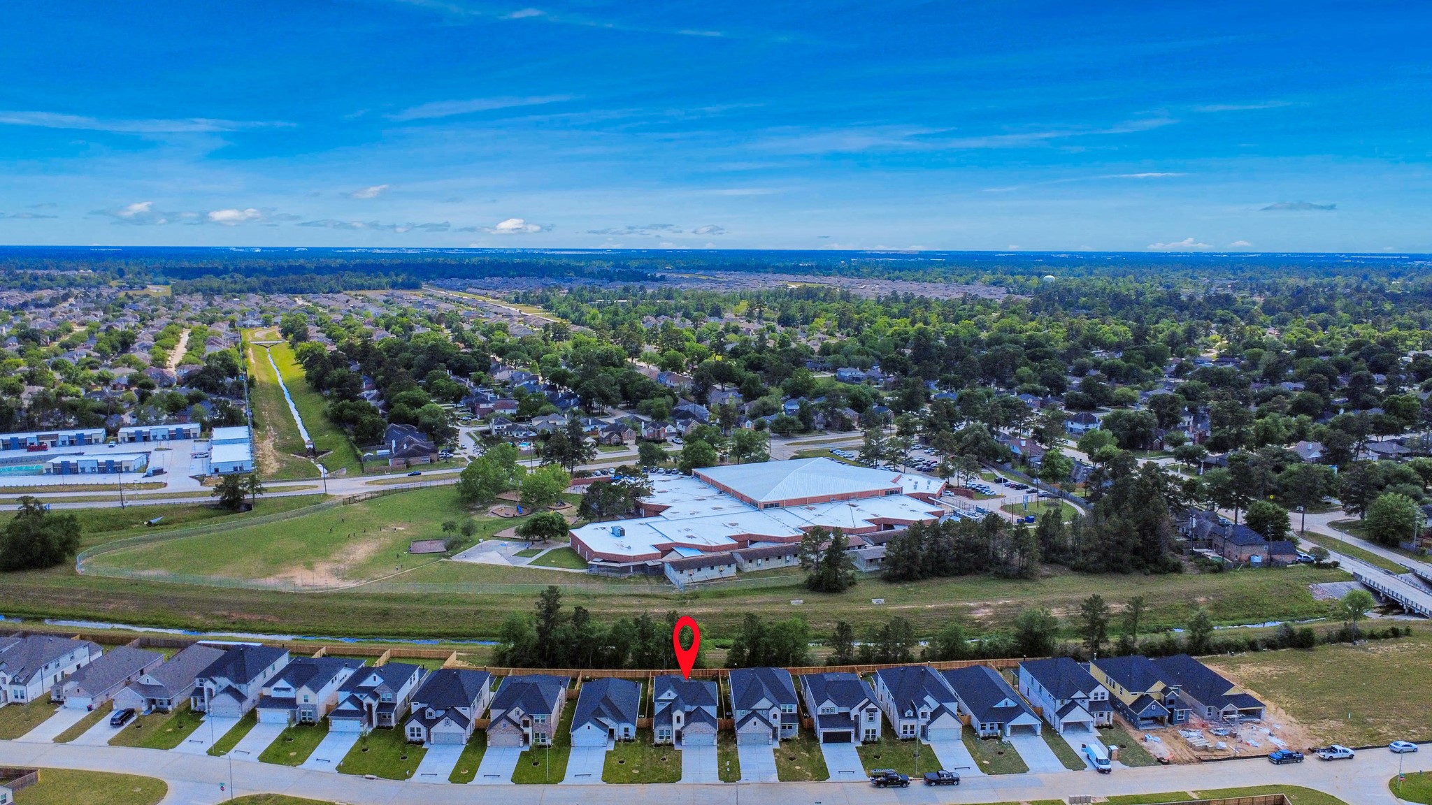 2946 Burris Park Drive Spring, TX 77373 - Photo 5 of 45 An aerial view of a spacious subdivision lot, highlighting a well-maintained yard and a fully fenced perimeter, offering both privacy and expansive outdoor space.