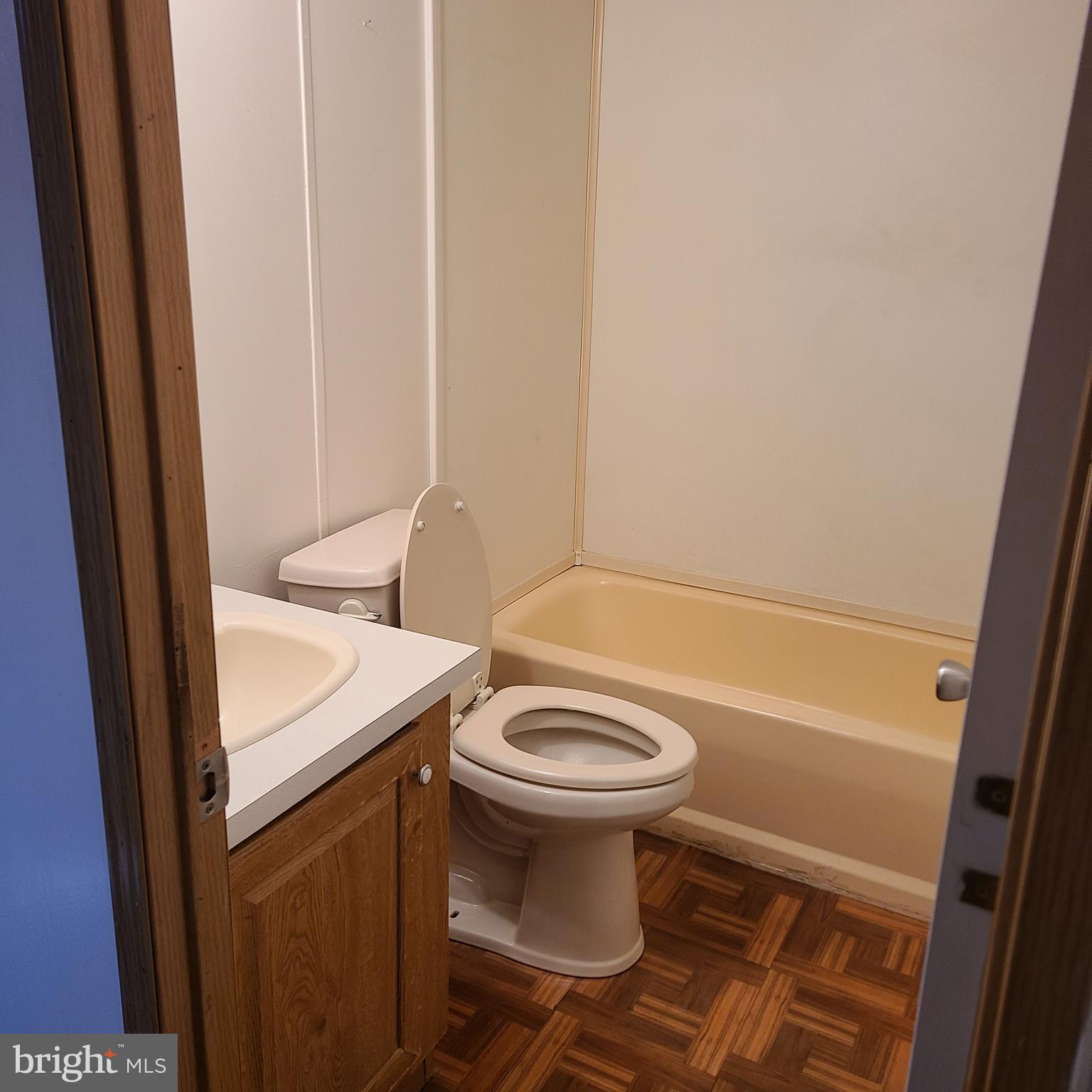 1679 South State Street, Unit A50 Dover, DE 19901 - Photo 6 of 6 a bathroom with a sink a toilet and bathtub