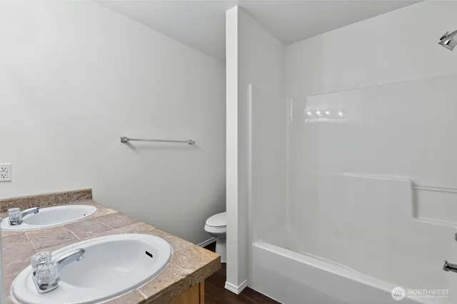 a bathroom with a sink and a toilet