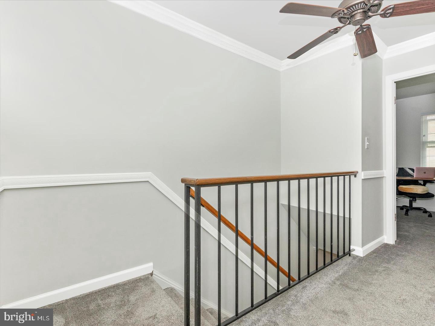 11349 Appledowre Way, Unit 313 Germantown, MD 20876 - Photo 11 of 27 a view of a hallway with a ceiling fan