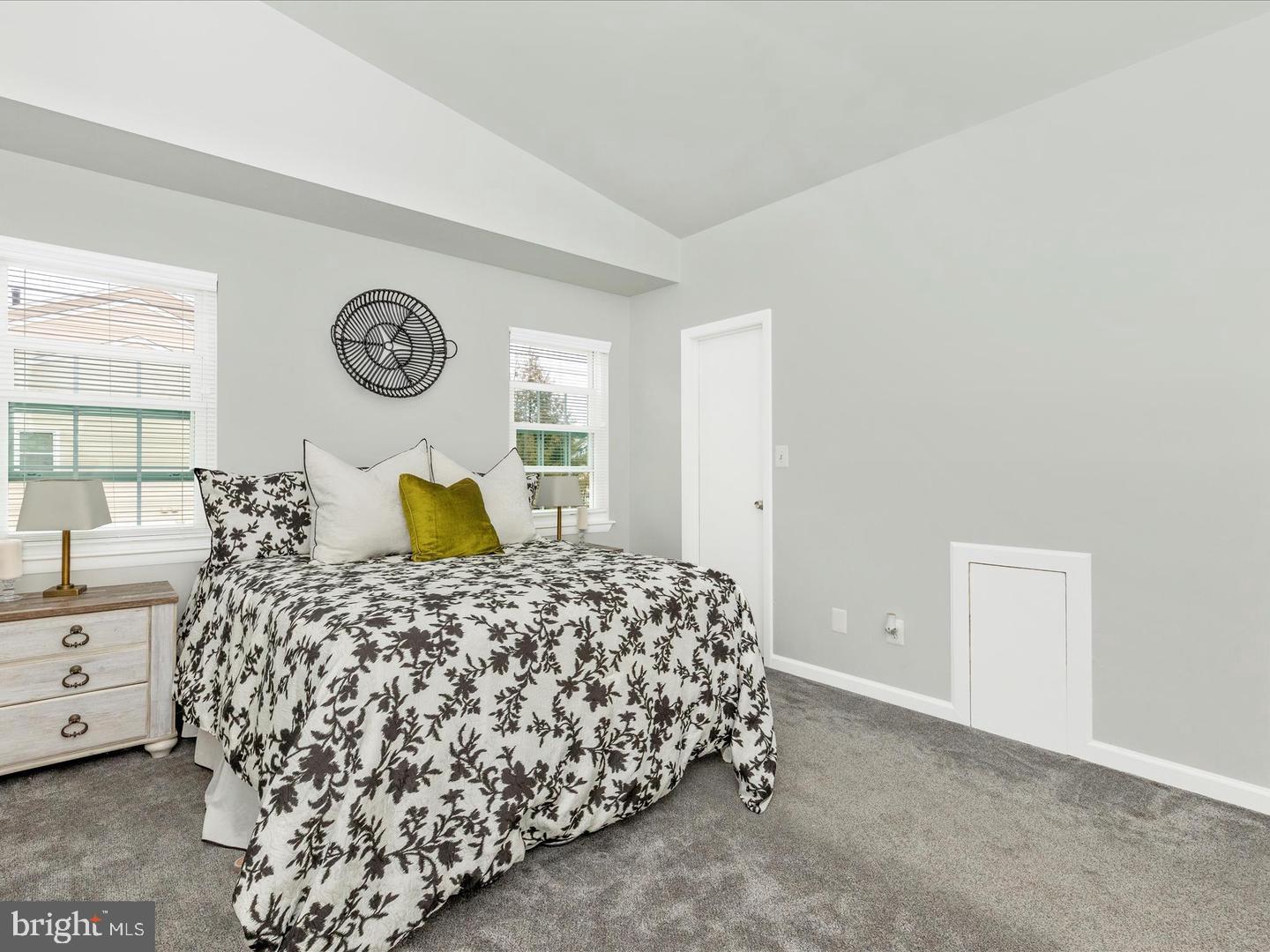 11349 Appledowre Way, Unit 313 Germantown, MD 20876 - Photo 12 of 27 a bedroom with a bed and window