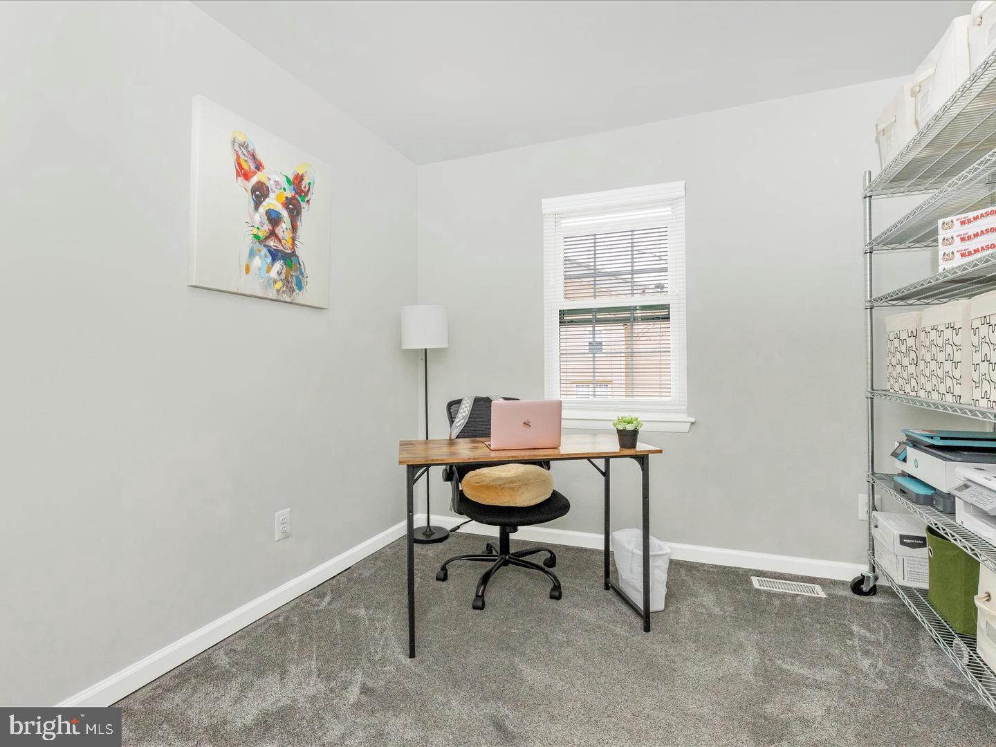 11349 Appledowre Way, Unit 313 Germantown, MD 20876 - Photo 20 of 27 a view of a workspace with furniture and a window