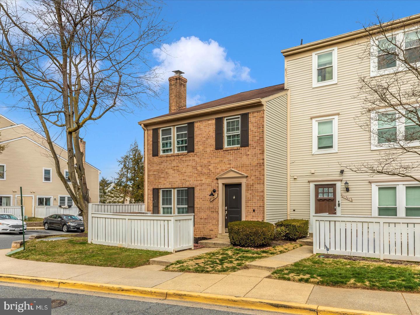 11349 Appledowre Way, Unit 313 Germantown, MD 20876 - Photo 27 of 27 a front view of a house with a yard