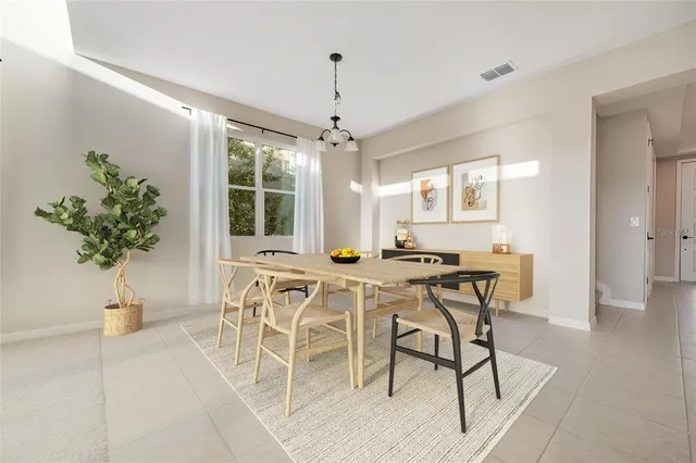 a kitchen with stainless steel appliances kitchen island granite countertop a stove and a sink