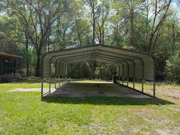 a view of backyard with green space