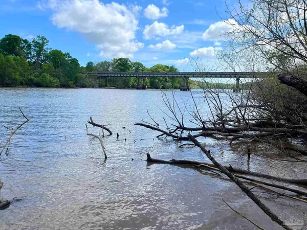 a view of a lake from a balcony