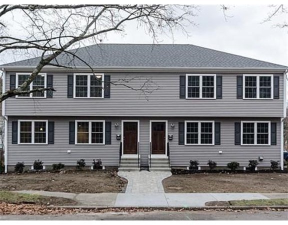 40 Beaconwood Road, Unit B Newton, MA 02461 - Photo 1 of 1 a front view of a house with a yard