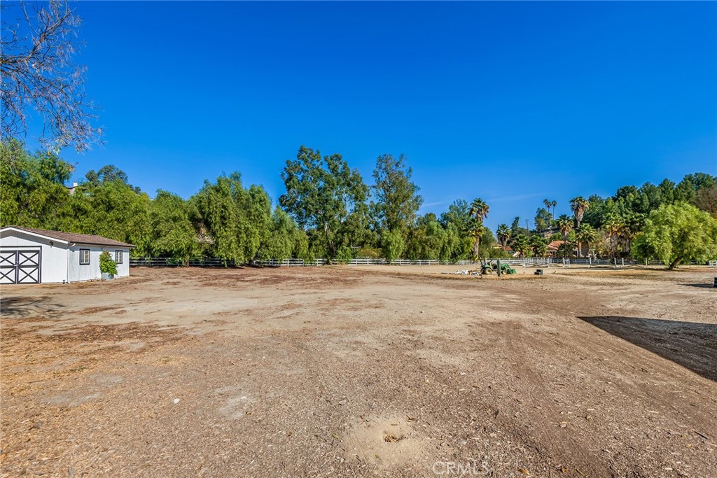 5547 Paradise Valley Road Hidden Hills, CA 91302 - Photo 3 of 12 a view of large yard with large trees