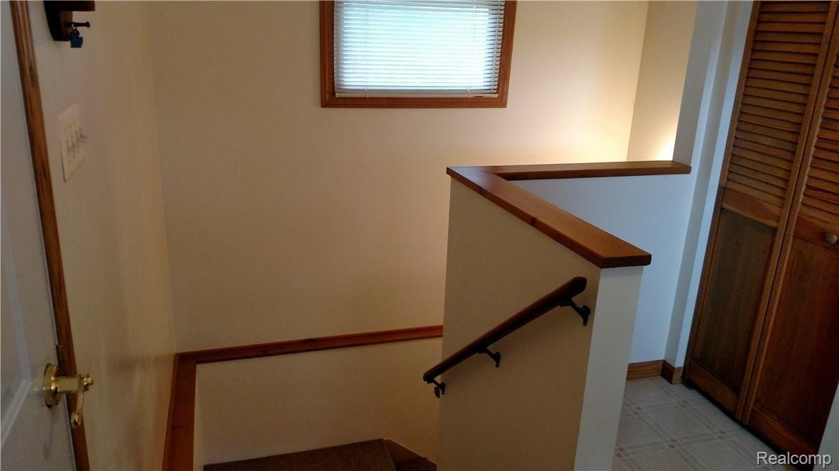5984 Brockway Road Peck, MI 48466 - Photo 16 of 24 This is a view of the stairway to the basement.