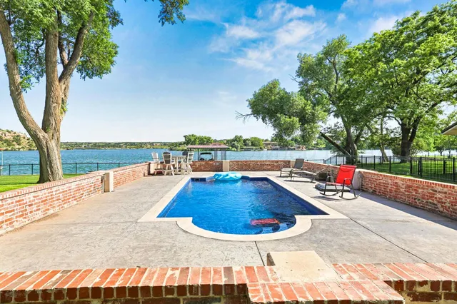 a bedroom with furniture and fireplace