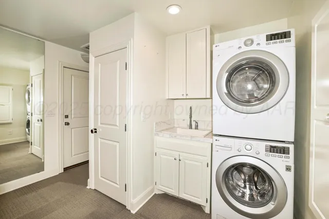 a bed room with a bed and a chair