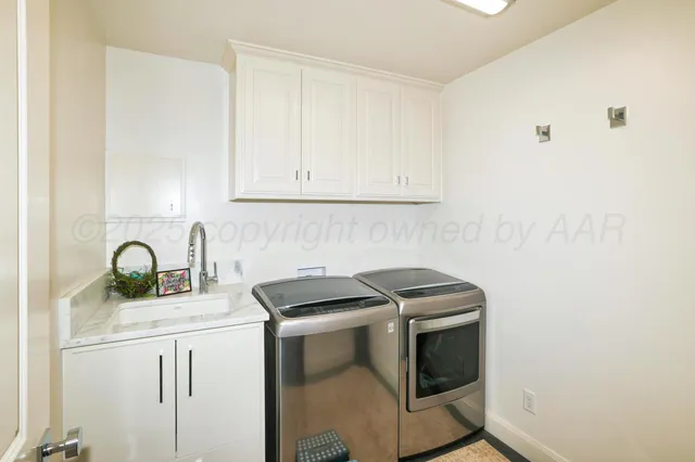 a view of a lake with houses in the back