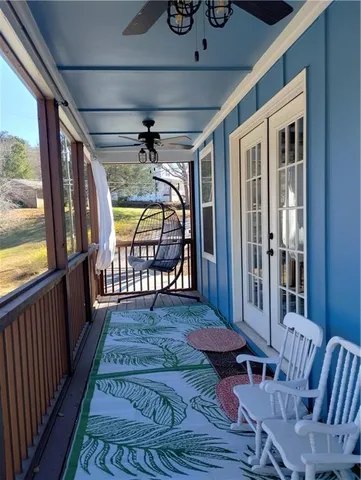 a view of a porch with furniture