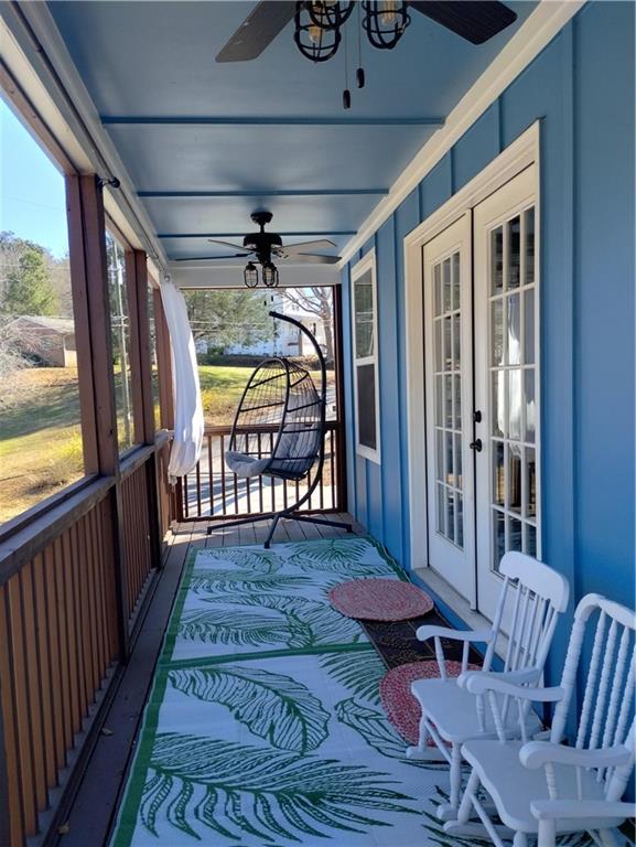 125 Strippling Street Ball Ground, GA 30107 - Photo 7 of 35 a view of a porch with furniture