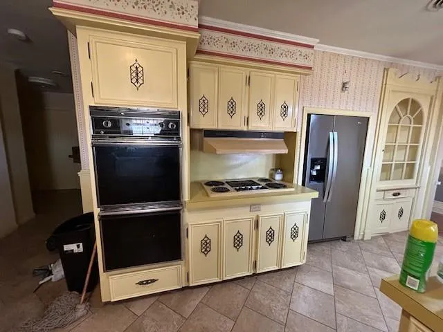 a bathroom with a sink a tub and a mirror