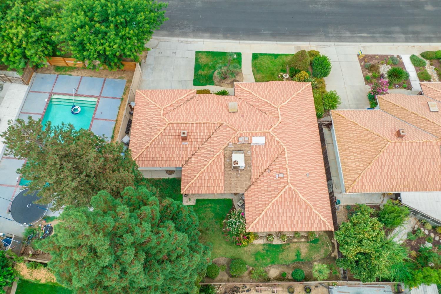 2370 Jonathan Way Madera, CA 93637 - Photo 35 of 41 an aerial view of a house with garden space and street view