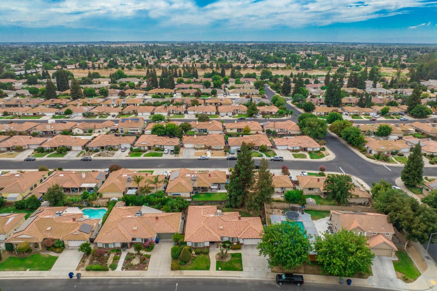 2370 Jonathan Way Madera, CA 93637 - Photo 36 of 41 an aerial view of residential houses with outdoor space