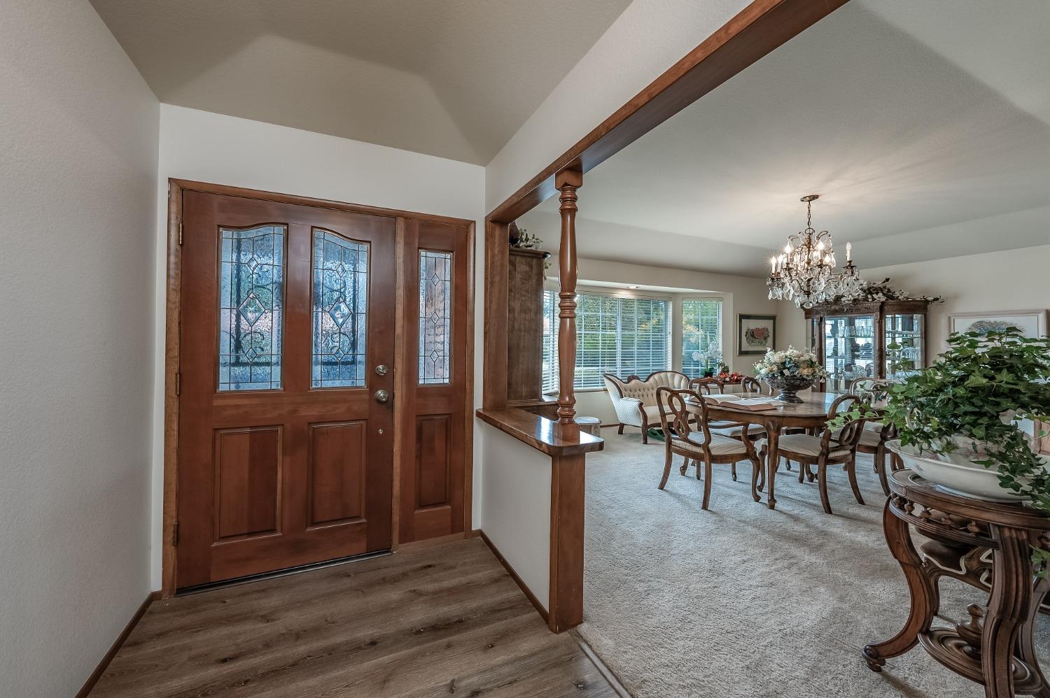 2370 Jonathan Way Madera, CA 93637 - Photo 4 of 41 a dining room with furniture window and wooden floor