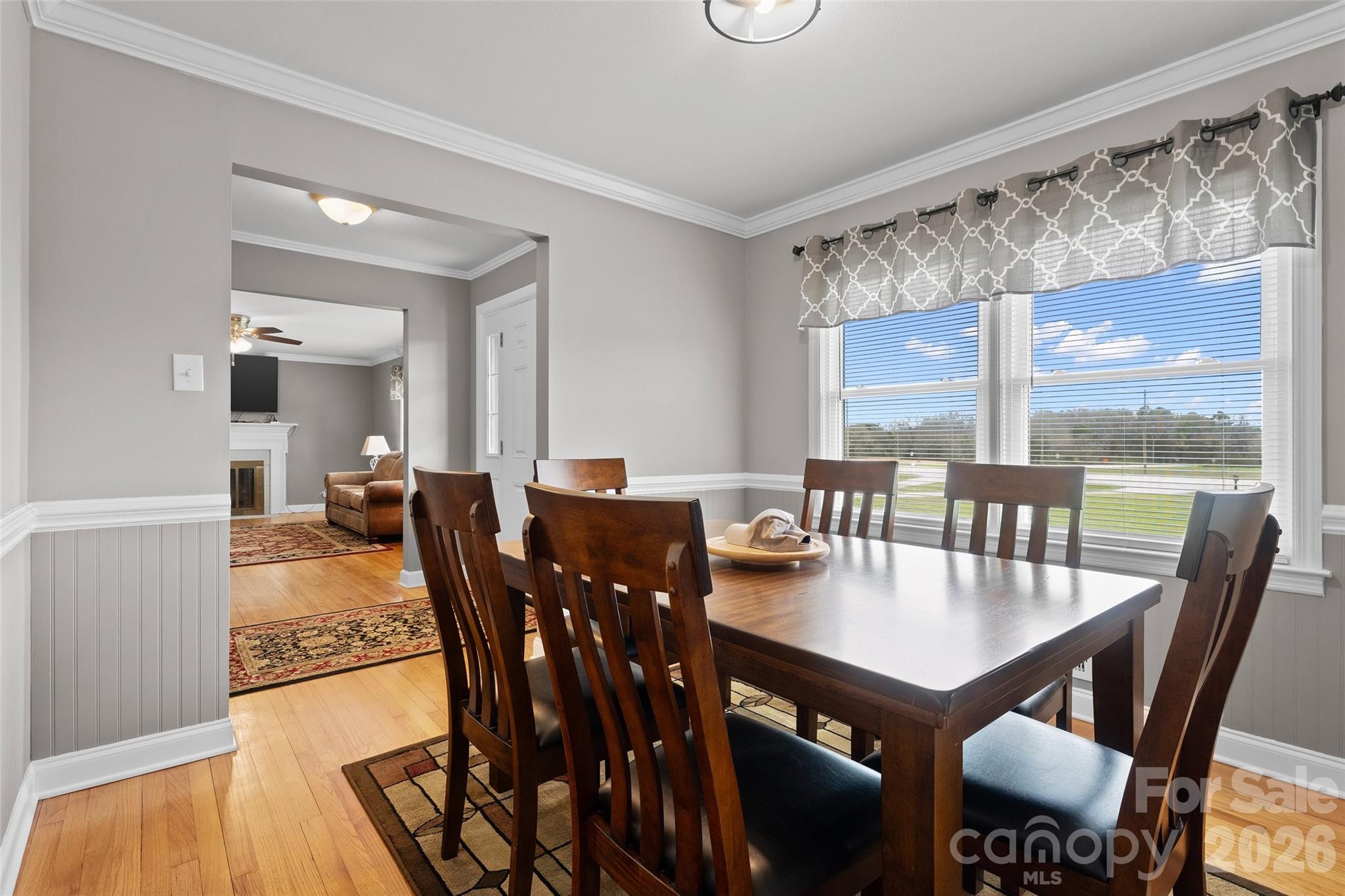 871 Saluda Road Chester, SC 29706 - Photo 12 of 46 a view of a dining room with furniture window and wooden floor