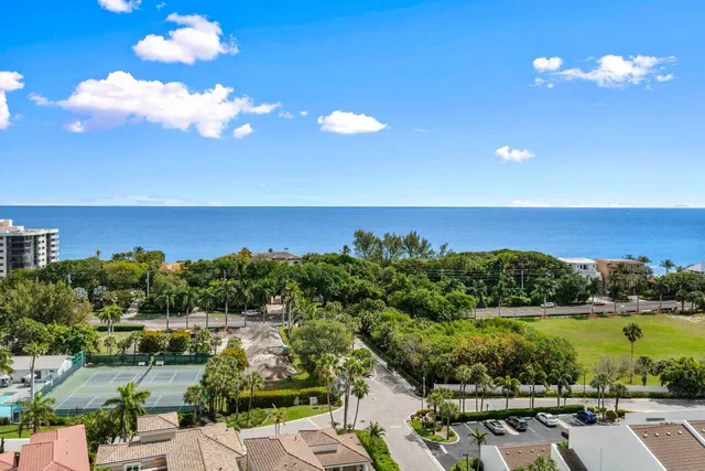 a view of a swimming pool with a patio