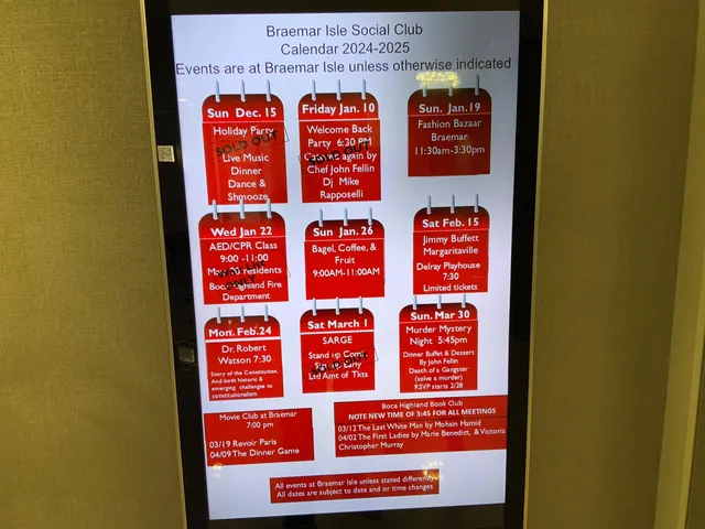 a living room with lots of furniture and a chandelier