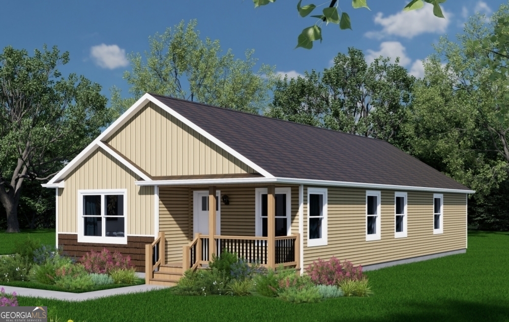 a view of a yard in front of a house with plants and large tree