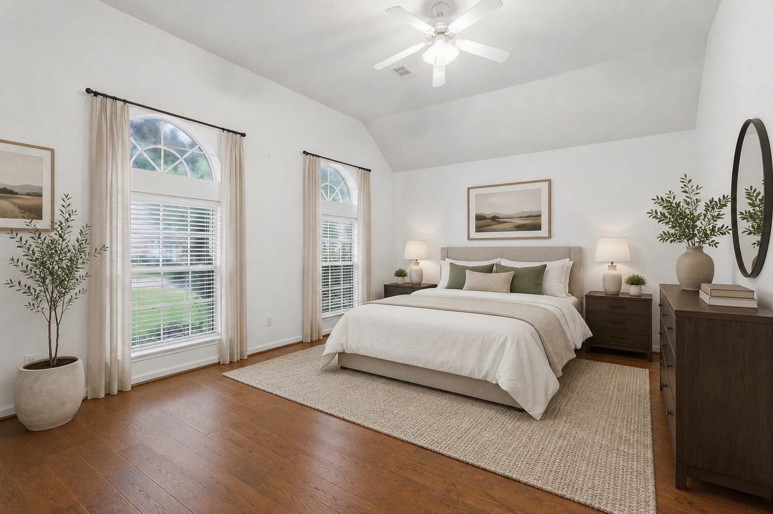 5815 Pheasant Ridge Lane Houston, TX 77041 - Photo 7 of 43 This private mother-in-law suite bedroom is massive and offers an exceptional retreat for guests or extended family. Featuring stunning large-plank wood flooring, soaring ceilings, and an abundance of space, this room feels both elegant and inviting. The generous layout provides plenty of flexibility for furnishings and a sitting area. This room has been virtually staged to showcase its potential.