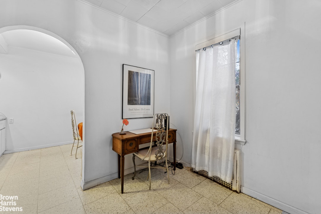 1702 East 28th Street Brooklyn, NY 11229 - Photo 10 of 17 a view of a hallway with chairs and closet