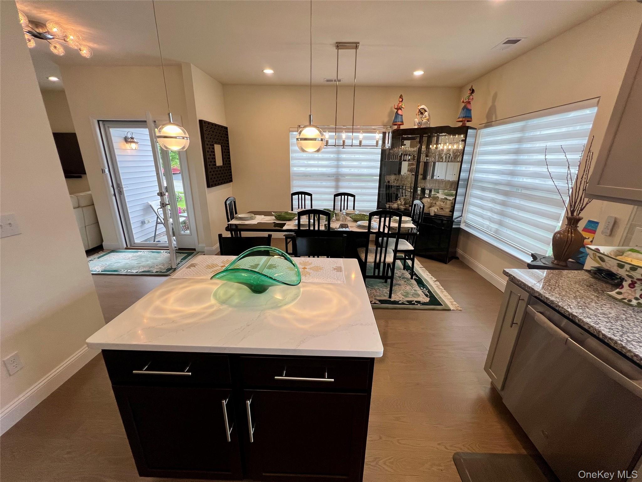 37 Willow Circle, Unit 37 Coram, NY 11727 - Photo 13 of 18 a kitchen with stainless steel appliances granite countertop a sink and a stove
