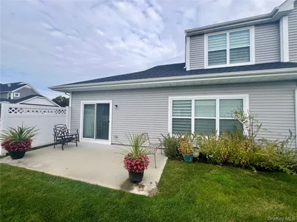 a house view with a garden space