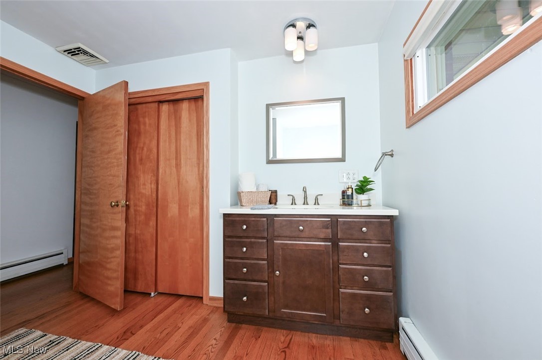 4597 Rock Cut Road Barberton, OH 44203 - Photo 21 of 44 *FULL BATHROOM W/EXPRESSO VANITY, EXTRA LIGHTING, GREAT SIZE, TUB/SHOWER W/TILE SURROUND ~