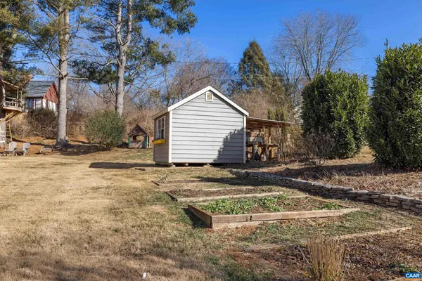 a view of yard covered with snow