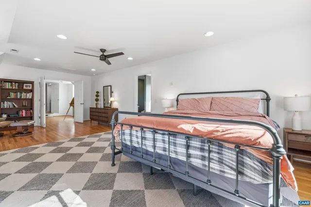 a view of a yard with a large tree