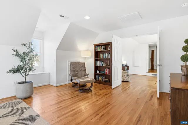 a view of a car park in front of house