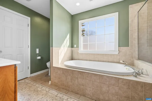 a view of a patio with iron fence