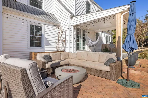 a view of a yard with a large tree