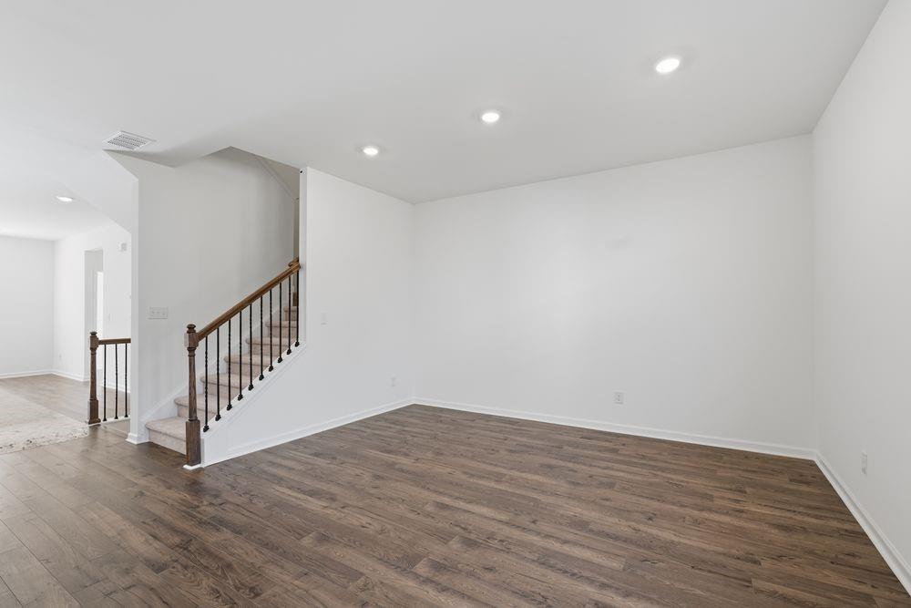 6121 Wayburn Street Tucker, GA 30084 - Photo 13 of 47 a view of a hallway with wooden floor